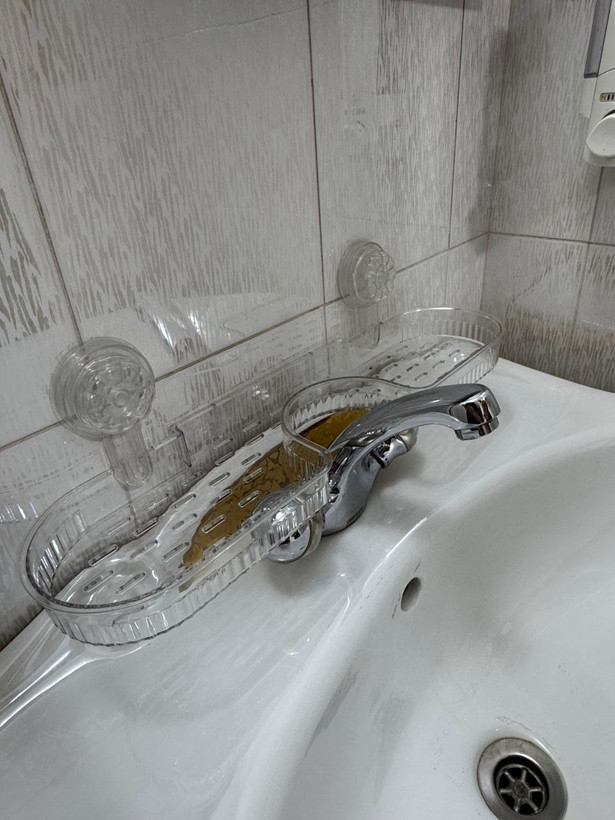 نظمدهندهی پشت شیر روشویی